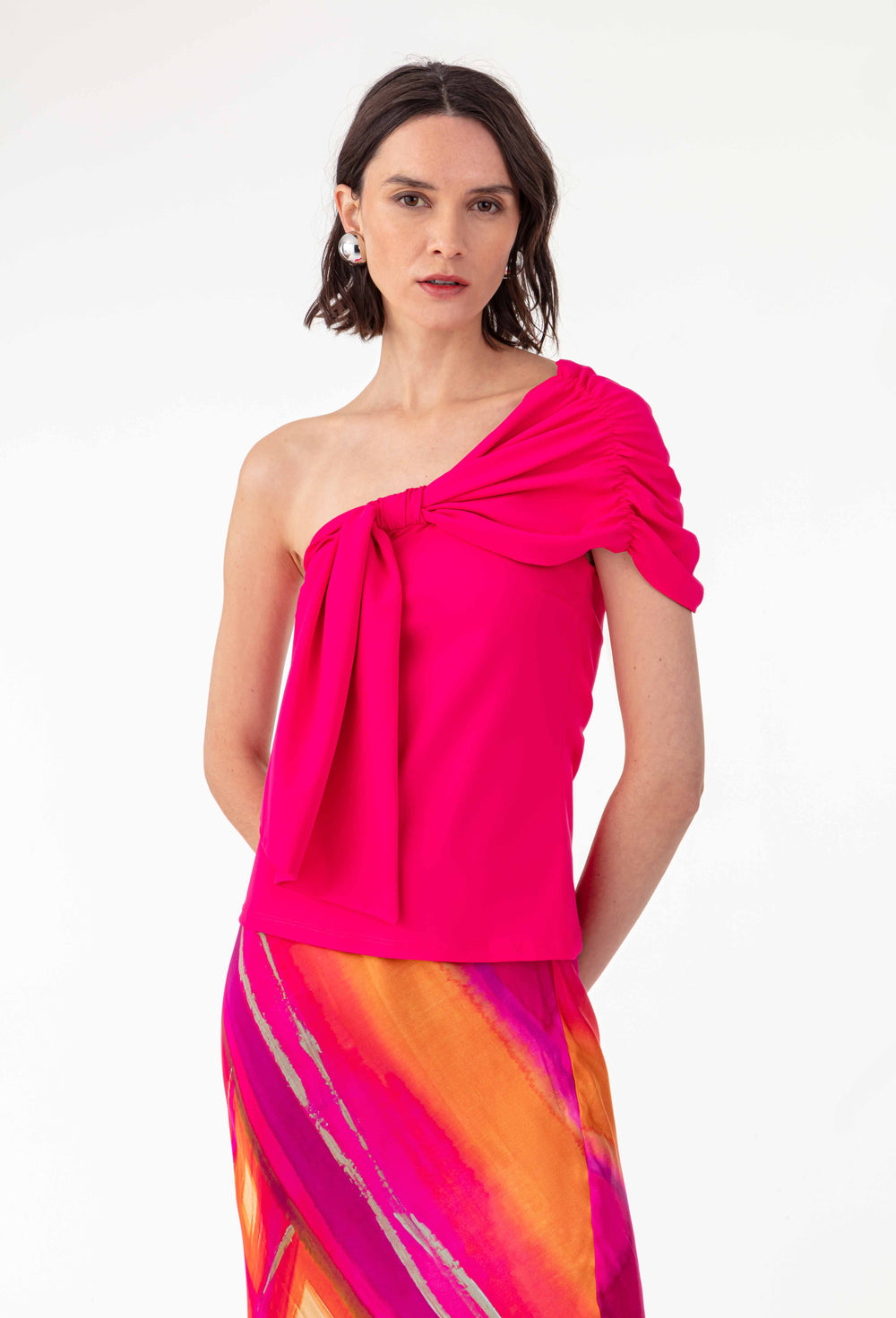 Top asymétrique Alma en jersey technique fuchsia 1